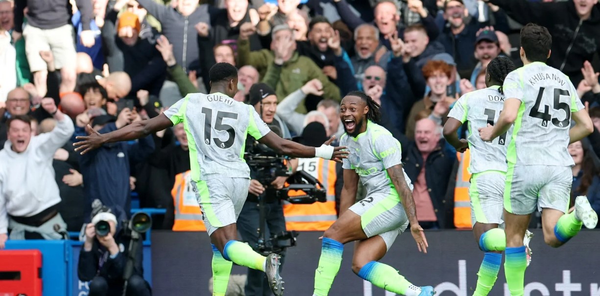 Marc Guehi celebrates with his Manchester City team mates after scoring the second goal in their 3-0 Premier League win over Chelsea at Stamford Bridge on Sunday.