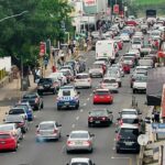 Vehicles navigate through Manzini city centre