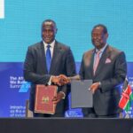 AFC President and CEO Samaila Zubairu and Kenya's Prime Cabinet Secretary Musalia Mudavadi sign the Host Country Agreement establishing AFC's first regional office in Nairobi, as President William Ruto looks on during the AFC Annual General Meeting.
