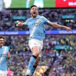 Manchester City players mob Nico González after his stunning long-range strike sealed a 2-1 FA Cup semi-final win over Championship side Southampton at Wembley