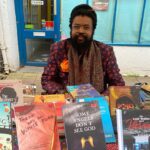 Nigerian author and filmmaker Onyeka Nwelue pictured with some of his more than 40 published books