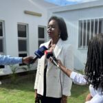 Newly elected Mozambican Bar Association President Thera Tobias Dai speaks to the media