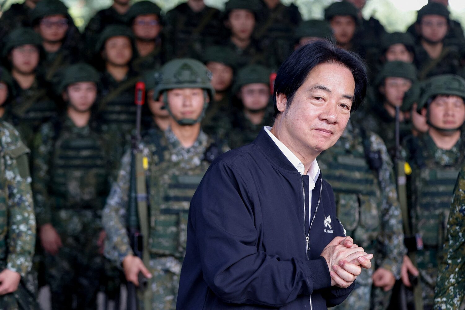 Taiwan President Lai Ching-te delivers a speech after inspecting reservists operating a Taiwan made Hummer 2 Drone during a training session at Loung Te Industrial Parks Service Center in Yilan, Taiwan December 2, 2025. REUTERS/Ann Wang/File Photo