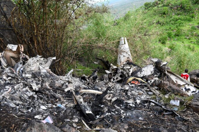 A member of the South Sudan Red Cross walks at the wreckage of a Cessna 208 Caravan operated by CityLink Aviation, that lost communication and crashed while flying from Yei to Juba International Airport, in Juba, South Sudan April 27, 2026. REUTERS/Samir Bol