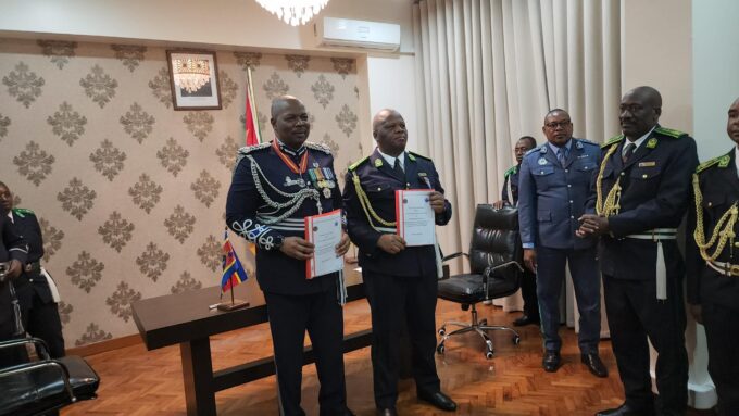 Royal Eswatini Police Service National Commissioner Manoma Vusie Masango and Police of the Republic of Mozambique Inspector General His Excellency Joaquim Adriano Sive hold the signed Memorandum of Understanding on police cooperation at the Police Headquarters in Maputo, Mozambique. Photo by REPS