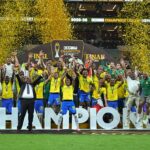 Mamelodi Sundowns players celebrate with the Caf Champions League trophy after sealing a 2-1 aggregate victory over AS FAR in Rabat on Sunday. (Photo: TotalEnergies CAF Champions League & Confederation Cup)