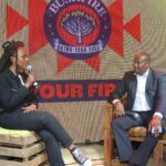 Prime Minister Russell Mmiso Dlamini speaks with festival host Phiwo Dhlamini at the MTN Bushfire Broadcast Corner during the 19th edition of the MTN Bushfire Festival in Malkerns. | Photo: Eswatini TV