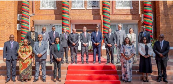 Zambian President Hakainde Hichilema poses for a group photo with newly appointed US chargé d'Affaires Mich Coker and their respective delegations during a courtesy call at State House in Lusaka on Wednesday, May 28, 2026.