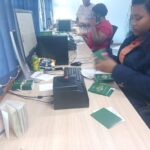 A Home Affairs official processes travel documents at one of the ministry's offices as the government moves to clear a passport backlog affecting thousands of Emaswati. Photo: Ministry of Home Affairs