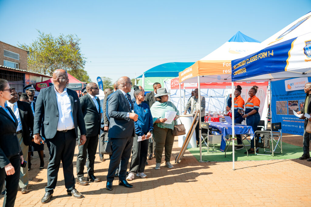 Botswana's Minister for State President, Defence and Security, Moeti Mohwasa, tours exhibitor stands at the 30th Business Botswana Northern Trade Fair, held under the theme "Value Chain Revolution: From Local Resources to Global Markets,"