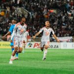 Oswin Appollis wheels away in celebration after converting from the penalty spot to complete Orlando Pirates' 3-0 win over Magesi FC at the New Peter Mokaba Stadium on Saturday night.