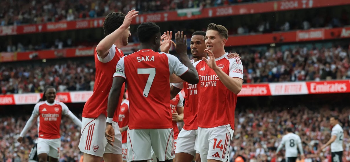 Arsenal striker Viktor Gyokeres celebrates with teammates after scoring one of his two goals during the Gunners' commanding 3-0 Premier League win over Fulham at the Emirates Stadium on Saturday,