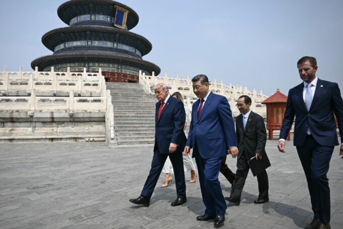 Trump and Xi Jinping walk together during the US-China summit in Beijing. | Brendan Smialowski/Pool/Getty Images Trump and Xi Jinping walk together during the US-China summit in Beijing. | Brendan Smialowski/Pool/Getty Images