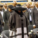 Boikaego Mogae, last born daughter of the late former Botswana President Festus Mogae, stands with distinguished guests during the memorial service held in honour of her father.