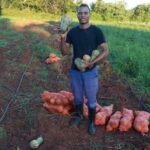 Herbet Zikhali Ncube with his butternut harvest in Lobamba Lomdzala. (Photo: Eswatini National Youth Council)