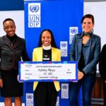 Peace Farm founder Katleho Mpopo displays her M62,000 Lesotho Innovation Challenge cheque alongside stakeholders. | Photo: NUL Research and Innovations