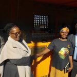Deputy Prime Minister Thulisile Dladla and Manzini South Inkhundla Minister Owen Nxumalo pose with one of the women traders at the newly opened Umbono Lomuhle Bomake Logoba Market in Manzini. (Photo: DPMO)