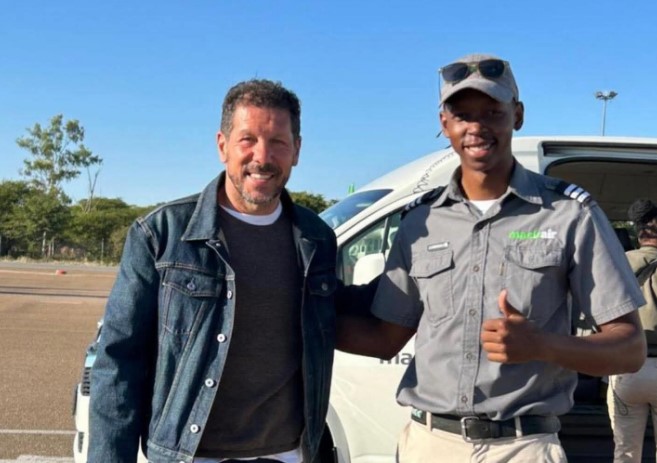 Diego Simeone, Atlético Madrid manager and the world's highest-paid football coach, pictured with a Mack Air employee at Maun International Airport before his charter flight into the Okavango Delta. (Photo: Ministry of Transport and Infrastructure — Botswana)