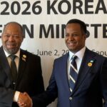Eswatini's Minister of Economic Planning and Development Dr. Thambo Gina (left) and Somalia's Foreign Affairs and International Cooperation Minister Abdisalam Ali shake hands during their bilateral meeting on the sidelines of the Korea-Africa Ministerial Meeting in Seoul on Sunday. | Photo: MoFA Somalia