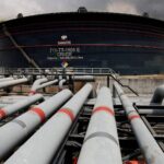 A Dangote crude oil tank is seen inside the Dangote Industries oil refinery and fertilizer plant site in the Ibeju Lekki district of Lagos, Nigeria March 2, 2026. REUTERS/Sodiq Adelakun/File Photo