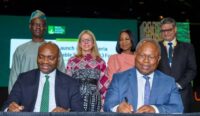Representatives from the Nigeria Sovereign Investment Authority (NSIA), Africa50 and their development partners sign the agreement for the $300 million Nigeria Distributed Renewable Energy Fund