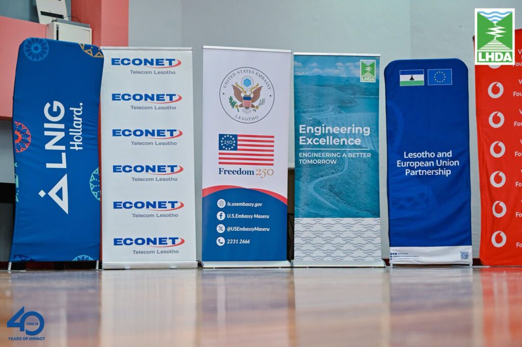 Banners displaying the logos of sponsors and partners supporting the Digital Innovators Summit 2026 at the National University of Lesotho.