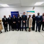 Minister of Finance Neal Rijkenberg joins Tanzanian officials and other participants for a group photograph following the signing of the Memoranda of Understanding on strengthening public sector financial management. Photo by Ministry of Finance, Eswatini.