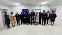 Minister of Finance Neal Rijkenberg joins Tanzanian officials and other participants for a group photograph following the signing of the Memoranda of Understanding on strengthening public sector financial management. Photo by Ministry of Finance, Eswatini.