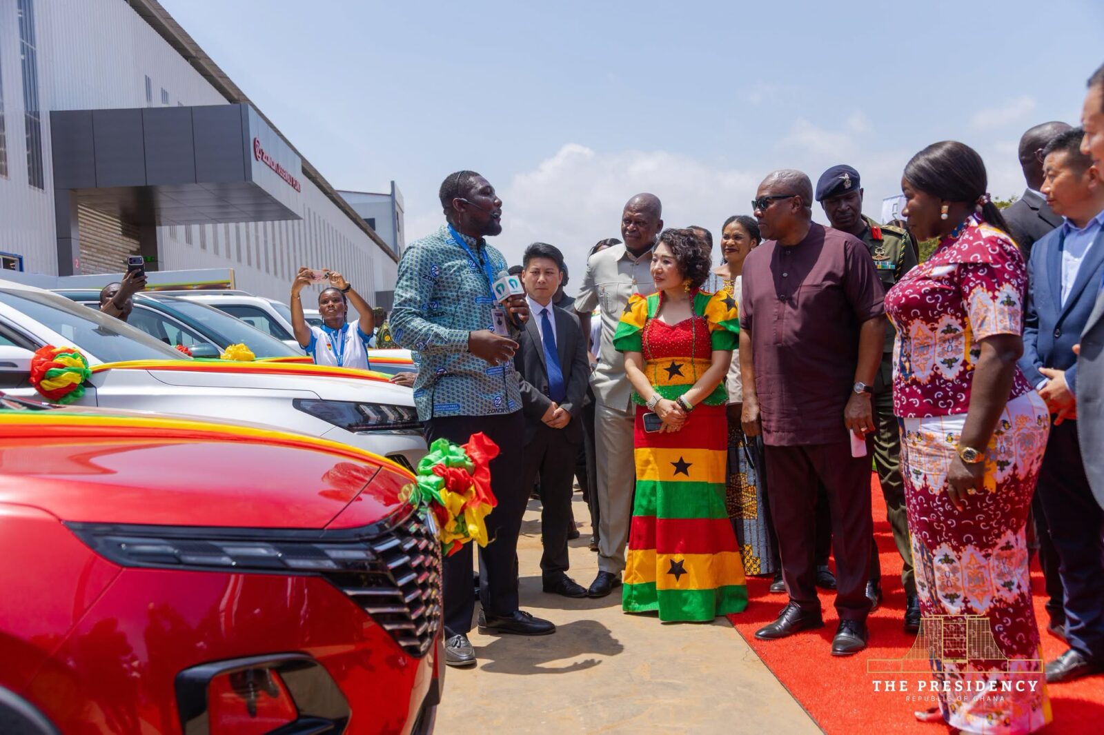 President John Dramani Mahama engages with members of the media during a tour of the expanded Zonda Tec Ghana Limited Assembly Plant in Tema, where he inspected the facility and its vehicle production operations.