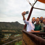 Tourists take in the scenic landscapes of the Free State from a hot air balloon, offering a unique perspective of South Africa’s countryside. Photo credit: South African Tourism