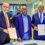 Ogun State Governor Dapo Abiodun and a DP World representative pose with Nigerian President Bola Ahmed Tinubu following the signing of the agreements in Paris, France. Photo: X/@sfojoemmanuela