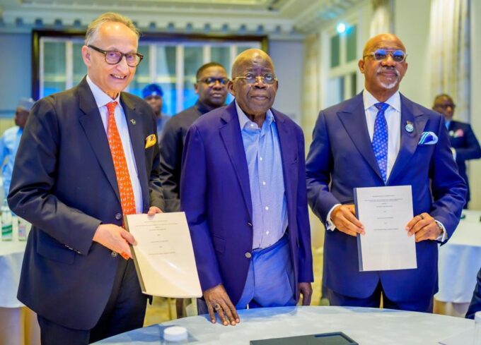 Ogun State Governor Dapo Abiodun and a DP World representative pose with Nigerian President Bola Ahmed Tinubu following the signing of the agreements in Paris, France. Photo: X/@sfojoemmanuela