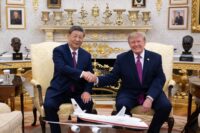 US President Donald Trump and Chinese President Xi Jinping shake hands during their meeting at the White House in Washington, DC.