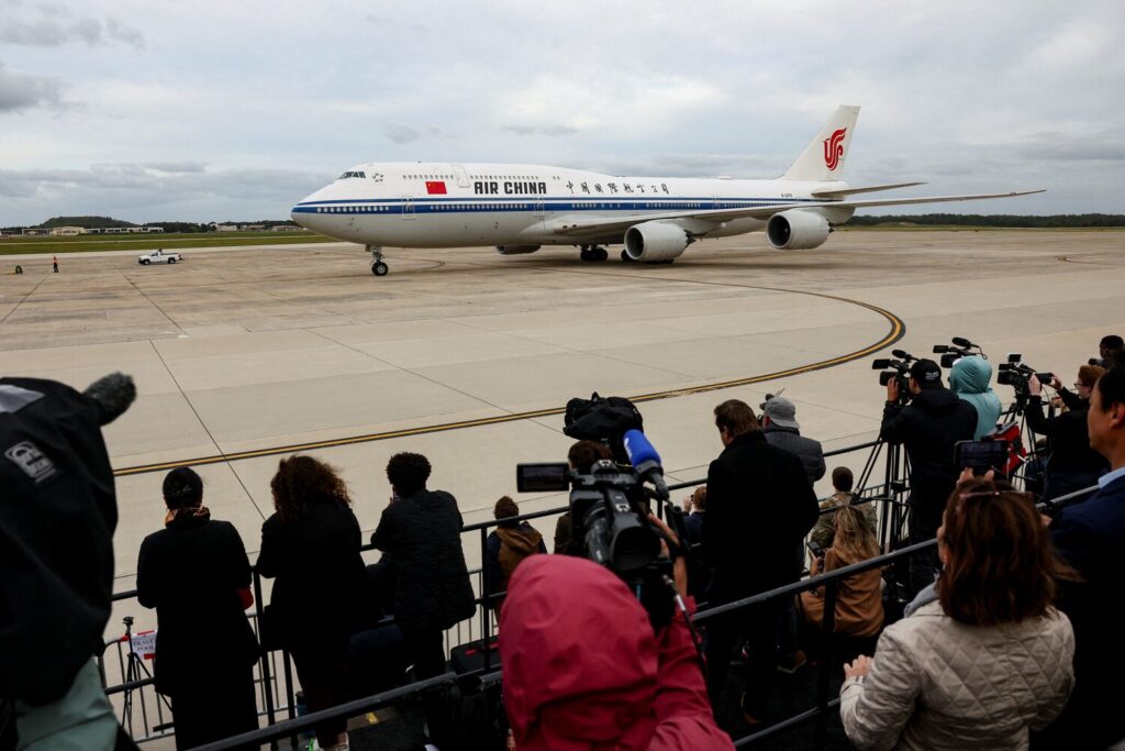 Members of the media work as a plane carrying Chinese President Xi Jinping arrives at Joint Base Andrews, in Maryland, US, September 23, 2026. REUTERS/Kevin Lamarque