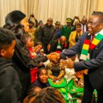 Zimbabwean President Emmerson Mnangagwa meets members of the Chivayo family at their home in Gletwyn, Harare