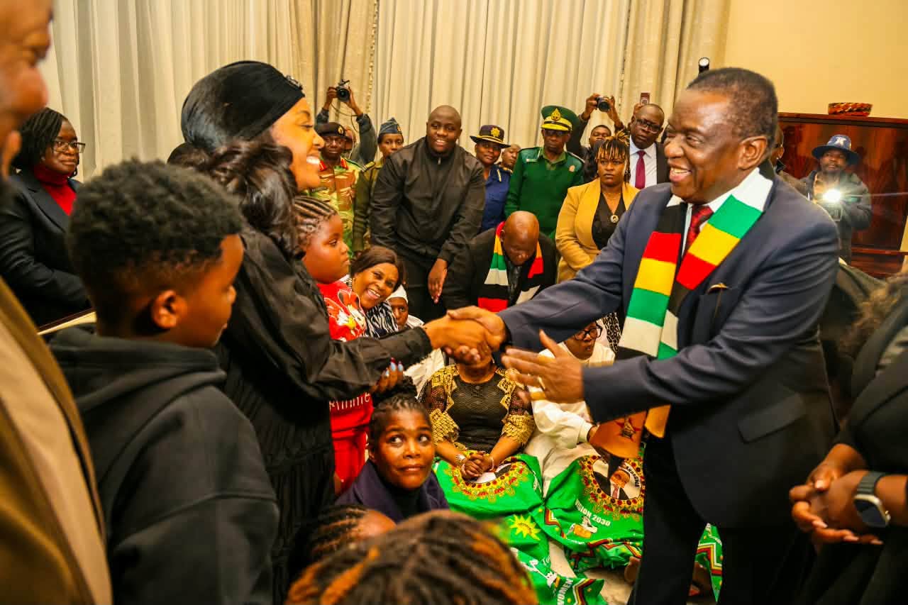 Zimbabwean President Emmerson Mnangagwa meets members of the Chivayo family at their home in Gletwyn, Harare