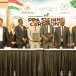 Officials from the Zambian government, ZESCO and EnerSynk Group pose for a group photograph following the signing of a 500MW Power Purchase Agreement
