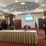 Russian and Mozambican officials sign the final protocol following the fourth meeting of the Russia Mozambique Intergovernmental Commission on economic and scientific and technical cooperation. Photo by African Initiative